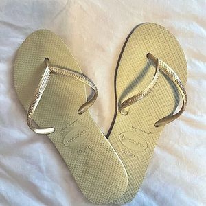 Gold Havaianas flip flops